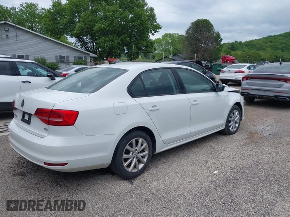 2015 Volkswagen Jetta SE z VIN 3VWD17AJ8FM323116, wystawiony jako IAAI lot #42246679 z przebiegiem 175 446 mil mil oraz . Historia ofert i sprzedaży dostępna na DreamBid. Obrazek 4.