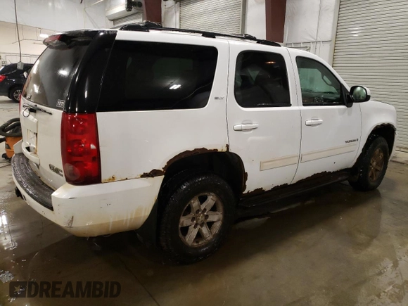 2009 GMC Yukon SLT w/4SB with VIN 1GKFK33099R252828, listed as a Copart auction lot 43205945 with 301,544 mi miles and Salvage Title. Bid and sale history available at carsss.com. Image 3.