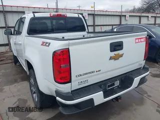 2018 Chevrolet Colorado 2WD Z71 with VIN 1GCGSDENXJ1275813, listed as a IAAI auction lot 41773753 with 38,148 mi miles and . Bid and sale history available at DreamBid. Image 3.