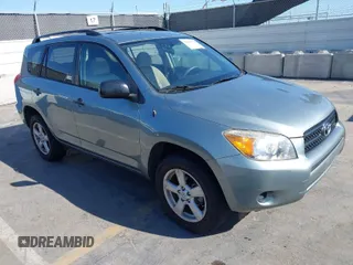 2006 Toyota RAV4 with VIN JTMZD33V465012121, listed as a IAAI auction lot 42013354 with 214,726 mi miles. Bid and sale history available at carsss.com. Image 1.