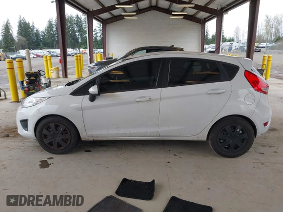 2013 Ford Fiesta S with VIN 3FADP4TJ4DM226897, listed as a IAAI auction lot 41916651 with 56,714 mi miles and . Bid and sale history available at DreamBid. Image 13.