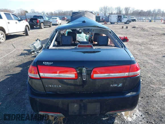2011 Lincoln MKZ z VIN 3LNHL2GC7BR768806, wystawiony jako IAAI lot #41654712 z przebiegiem 77 661 mil mil oraz . Historia ofert i sprzedaży dostępna na DreamBid. Obrazek 13.