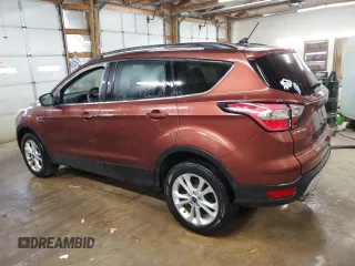 2018 Ford Escape SE z VIN 1FMCU9GD2JUA21582, wystawiony jako Copart lot #56165155 z przebiegiem 88 881 mil mil oraz Czysty tytuł • Clean title. Historia ofert i sprzedaży dostępna na DreamBid. Obrazek 2.
