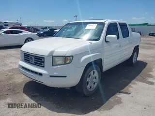 2007 Honda Ridgeline RTL z VIN 2HJYK16537H527957, wystawiony jako IAAI lot #42098143 z przebiegiem 233 163 mil mil oraz . Historia ofert i sprzedaży dostępna na DreamBid. Obrazek 2.
