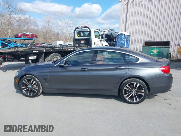 2016 BMW 4 Series 428i xDrive with VIN WBA4C9C56GG140427, listed as a IAAI auction lot 41886670 with 94,426 mi miles and . Bid and sale history available at carsss.com. Image 14.
