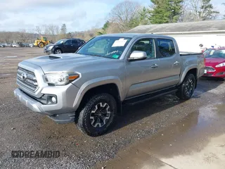 2016 Toyota Tacoma SR with VIN 3TMCZ5AN9GM001620, listed as a IAAI auction lot 41902924 with 117,462 mi miles. Bid and sale history available at carsss.com. Image 2.