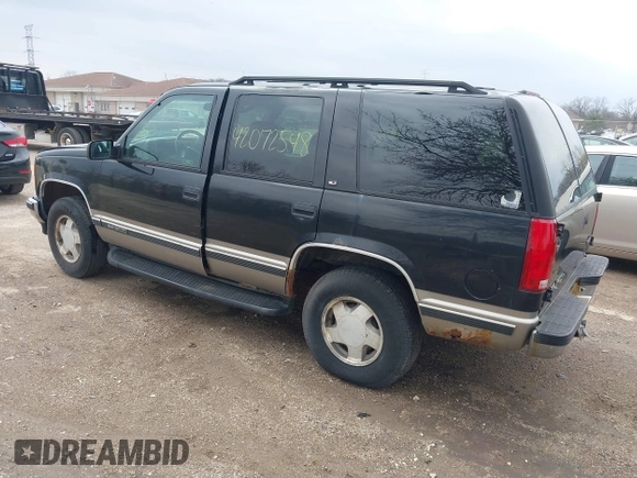 1998 GMC Yukon with VIN 1GKEK13R9WJ734112, listed as a IAAI auction lot 42072548 with 226,061 mi miles. Bid and sale history available at carsss.com. Image 3.
