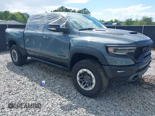 2021 Ram 1500 TRX with VIN 1C6SRFU92MN900179, listed as a IAAI auction lot 42031887 with 3,849 mi miles and . Bid and sale history available at DreamBid. Image 1.