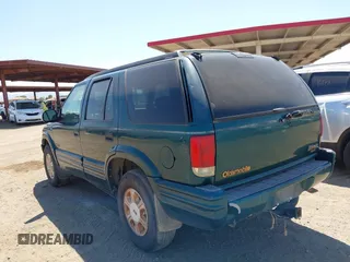 1996 Oldsmobile Bravada z VIN 1GHDT13W5T2711291, wystawiony jako IAAI lot #42502672 z przebiegiem 219 062 mil mil oraz . Historia ofert i sprzedaży dostępna na DreamBid. Obrazek 14.
