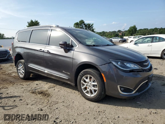 2020 Chrysler Pacifica Touring L with VIN 2C4RC1BG5LR124953, listed as a Copart auction lot 59874695 with 67,855 mi miles and Salvage title. Bid and sale history available at DreamBid. Image 4.