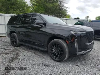 2021 Cadillac Escalade Sport Platinum with VIN 1GYS4GKL7MR338004, listed as a Copart auction lot 61612345 with 47,300 mi miles and Salvage title. Bid and sale history available at DreamBid. Image 4.