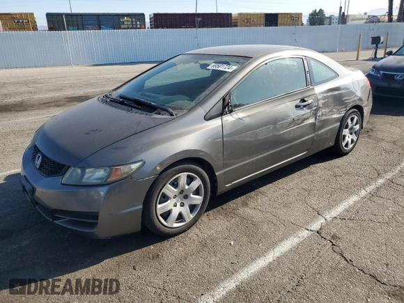 2010 Honda Civic Cpe LX with VIN 2HGFG1B61AH529839, listed as a Copart auction lot 69501724 with 218,443 mi miles and Salvage Title. Bid and sale history available at carsss.com. Image 1.