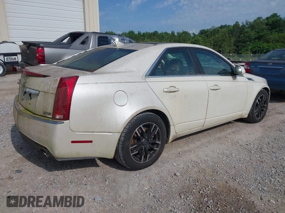 2009 Cadillac CTS RWD with VIN 1G6DF577690108865, listed as a IAAI auction lot 42314121 with 153,702 mi miles and . Bid and sale history available at DreamBid. Image 4.