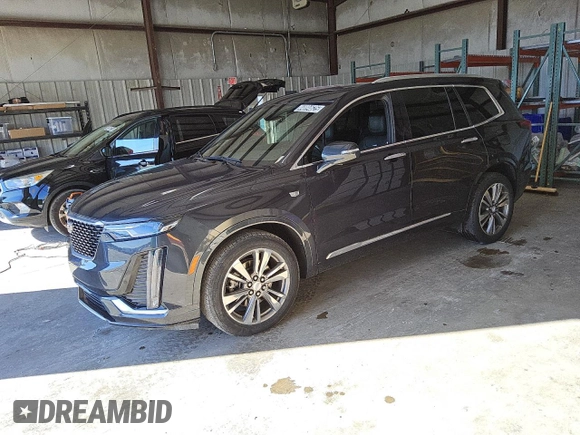 2021 Cadillac XT6 Premium Luxury z VIN 1GYKPDRS7MZ179150, wystawiony jako Copart lot #44894625 z przebiegiem 48 869 mil mil oraz Czysty tytuł • Clean title. Historia ofert i sprzedaży dostępna na DreamBid. Obrazek 1.