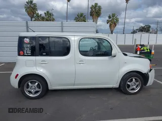 2010 Nissan Cube S z VIN JN8AZ2KRXAT161347, wystawiony jako IAAI lot #41921669 z przebiegiem 161 121 mil mil oraz . Historia ofert i sprzedaży dostępna na DreamBid. Obrazek 13.