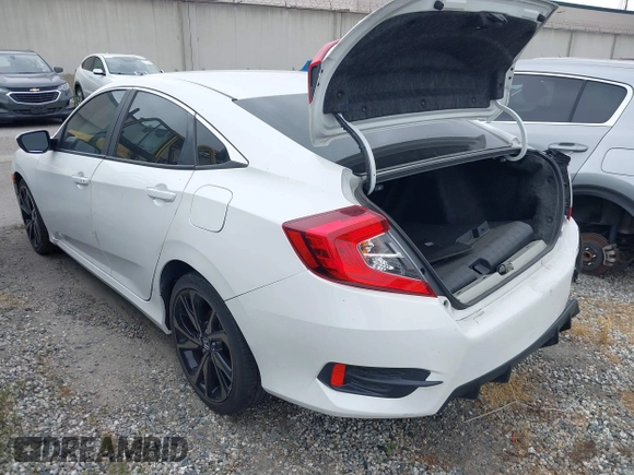2019 Honda Civic Sport with VIN 2HGFC2F85KH512587, listed as a IAAI auction lot 41708347 with 63,895 mi miles and . Bid and sale history available at DreamBid. Image 3.