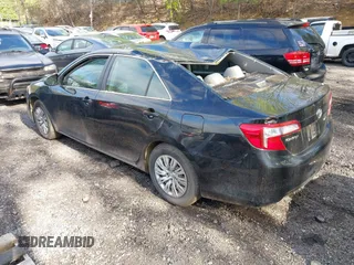 2014 Toyota Camry L with VIN 4T4BF1FK7ER395057, listed as a IAAI auction lot 42215441 with 166,247 mi miles and . Bid and sale history available at DreamBid. Image 3.