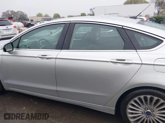 2016 Ford Fusion Titanium with VIN 3FA6P0K91GR360914, listed as a IAAI auction lot 41833665 with 107,367 mi miles and . Bid and sale history available at DreamBid. Image 14.
