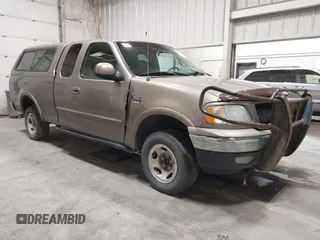 2001 Ford F-150 XL z VIN 1FTRX18W91NB49304, wystawiony jako IAAI lot #42316935 z przebiegiem 258 410 mil mil oraz . Historia ofert i sprzedaży dostępna na DreamBid. Obrazek 1.