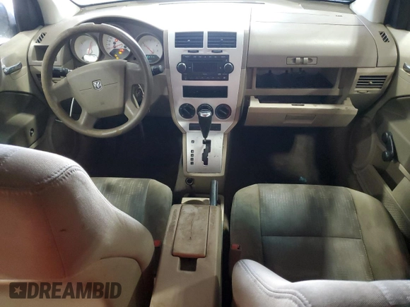 2008 Dodge Caliber SE z VIN 1B3HB28B58D717630, wystawiony jako Copart lot #46232175 z przebiegiem 242 361 mil mil oraz Nie do naprawy • Non repairable. Historia ofert i sprzedaży dostępna na DreamBid. Obrazek 8.