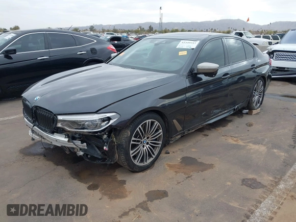 2019 BMW 5 Series M550i xDrive with VIN WBAJB9C51KB287797, listed as a IAAI auction lot 41549311 with 61,459 mi miles and . Bid and sale history available at DreamBid. Image 2.
