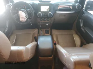 2011 Jeep Wrangler Unlimited Rubicon with VIN 1J4HA6H1XBL589103, listed as a Copart auction lot 59371155 with 156,320 mi miles and Salvage title. Bid and sale history available at DreamBid. Image 8.