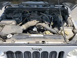 2007 Jeep Wrangler Unlimited Sahara with VIN 1J8GA59137L181360, listed as a Copart auction lot 62311225 with 151,393 mi miles and Salvage title. Bid and sale history available at DreamBid. Image 11.