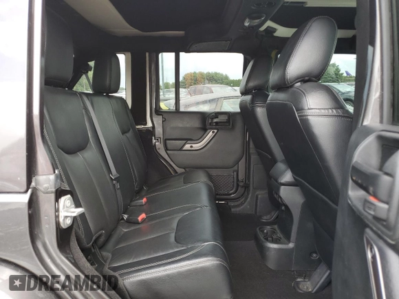 2018 Jeep Wrangler Unlimited Sahara with VIN 1C4BJWEG4JL822007, listed as a Copart auction lot 61450915 with 91,148 mi miles and Salvage title. Bid and sale history available at DreamBid. Image 11.