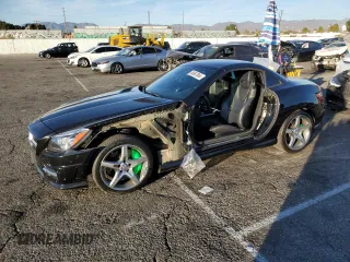 2015 Mercedes-Benz SLK-Class SLK 350 with VIN WDDPK5HA4FF100858, listed as a Copart auction lot 80667864 with 101,052 mi miles and Salvage Title. Bid and sale history available at carsss.com. Image 1.