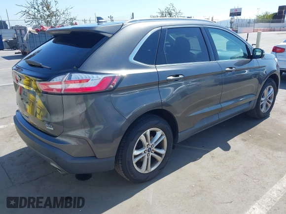 2019 Ford Edge SEL with VIN 2FMPK3J9XKBB76512, listed as a IAAI auction lot 42498683 with 119,513 mi miles and . Bid and sale history available at DreamBid. Image 4.