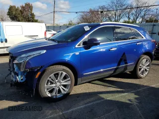 2023 Cadillac XT5 AWD Premium Luxury with VIN 1GYKNDR49PZ135890, listed as a Copart auction lot 79808584 with 21,708 mi miles and Salvage Title. Bid and sale history available at DreamBid. Image 1.