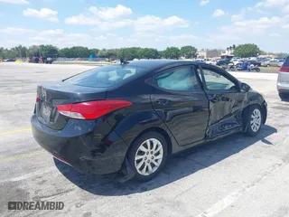 2012 Hyundai Elantra GLS with VIN KMHDH4AE0CU231369, listed as a IAAI auction lot 42067626 with 134,274 mi miles. Bid and sale history available at carsss.com. Image 4.
