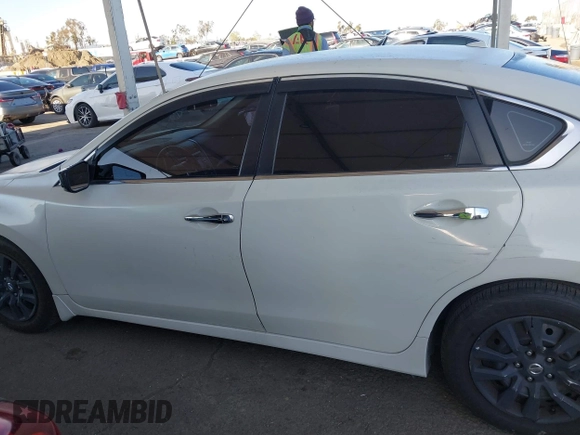 2015 Nissan Altima 2.5 S with VIN 1N4AL3AP6FC228428, listed as a IAAI auction lot 41966303 with 118,706 mi miles. Bid and sale history available at carsss.com. Image 14.