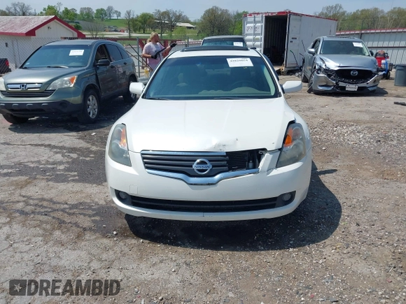 2009 Nissan Altima 2.5 S with VIN 1N4AL21E89N561120, listed as a IAAI auction lot 42020054 with 220,237 mi miles. Bid and sale history available at carsss.com. Image 12.