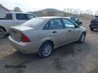 2007 Ford Focus S with VIN 1FAFP34N17W332474, listed as a IAAI auction lot 42052900 with 92,400 mi miles and . Bid and sale history available at carsss.com. Image 4.