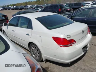 2010 Toyota Avalon XL with VIN 4T1BK3DB6AU363456, listed as a IAAI auction lot 41909395 with 251,402 mi miles and . Bid and sale history available at DreamBid. Image 3.