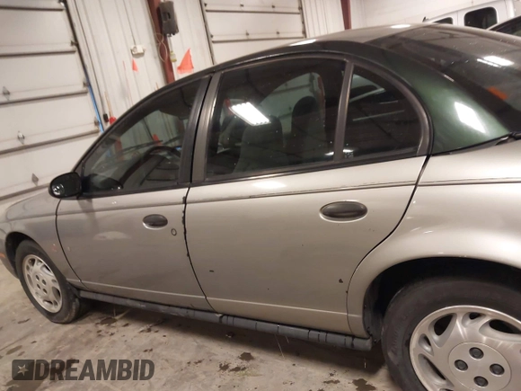 1997 Saturn SL with VIN 1G8ZH5280VZ172929, listed as a IAAI auction lot 41273214 with 134,972 mi miles. Bid and sale history available at carsss.com. Image 15.
