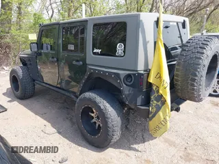 2007 Jeep Wrangler Unlimited X with VIN 1J4GA39147L101084, listed as a IAAI auction lot 41988628 with 194,562 mi miles and . Bid and sale history available at DreamBid. Image 3.