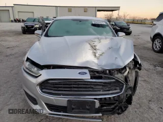 2015 Ford Fusion SE Hybrid with VIN 3FA6P0LU5FR199498, listed as a Copart auction lot 84020974 with 0 mi miles and Salvage Title. Bid and sale history available at carsss.com. Image 5.