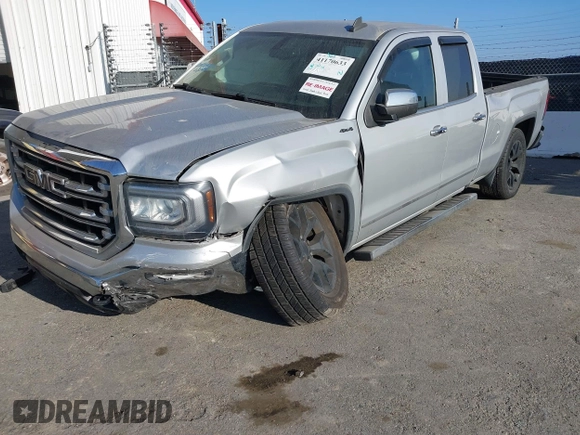 2017 GMC Sierra 1500 SLT z VIN 1GTV2NEC6HZ102412, wystawiony jako IAAI lot #41170633 z przebiegiem 163 321 mil mil oraz . Historia ofert i sprzedaży dostępna na DreamBid. Obrazek 2.