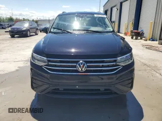 2024 Volkswagen Tiguan SE with VIN 3VV3B7AX8RM027356, listed as a Copart auction lot 56057415 with 33,197 mi miles and Salvage title. Bid and sale history available at DreamBid. Image 5.