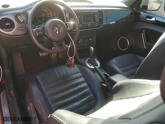 2012 Volkswagen Beetle 2.0T Turbo PZEV with VIN 3VWVA7AT5CM609295, listed as a Copart auction lot 75624374 with 55,287 mi miles and Non Repairable. Bid and sale history available at carsss.com. Image 8.