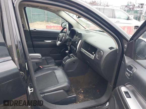 2016 Jeep Compass Latitude with VIN 1C4NJCEBXGD642680, listed as a IAAI auction lot 41511653 with 122,742 mi miles. Bid and sale history available at carsss.com. Image 5.
