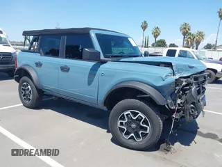 2022 Ford Bronco with VIN 1FMEE5DH2NLB88185, listed as a IAAI auction lot 42310207 with 24,641 mi miles and . Bid and sale history available at DreamBid. Image 1.