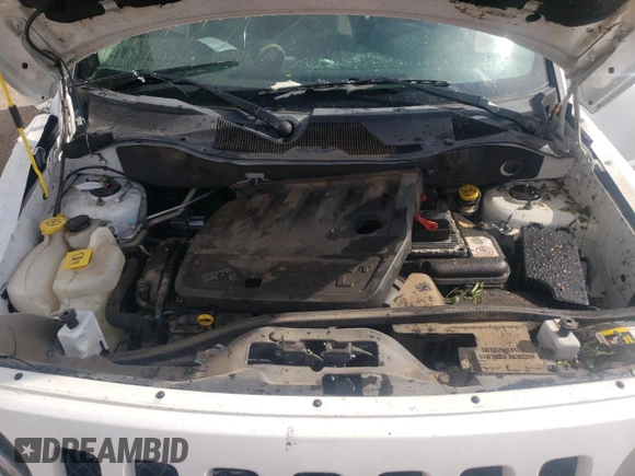2014 Jeep Patriot Sport with VIN 1C4NJPBB9ED912846, listed as a Copart auction lot 58866985 with 191,195 mi miles and Salvage title. Bid and sale history available at DreamBid. Image 12.