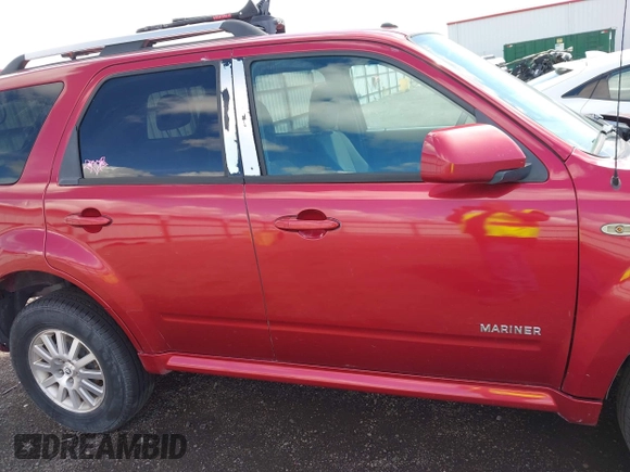 2008 Mercury Mariner Premier with VIN 4M2CU97178KJ00739, listed as a IAAI auction lot 42312408 with 167,591 mi miles and . Bid and sale history available at DreamBid. Image 13.