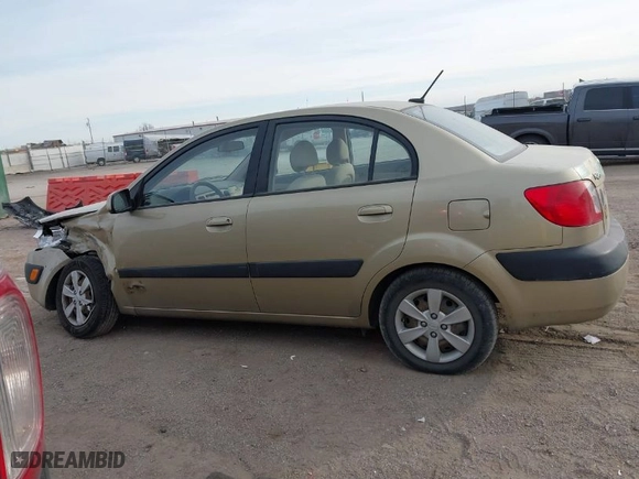 2009 Kia Rio with VIN KNADE223096461583, listed as a IAAI auction lot 41511296 with NaN miles. Bid and sale history available at carsss.com. Image 15.