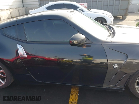 2014 Nissan 370Z Touring with VIN JN1AZ4EH1EM631097, listed as a IAAI auction lot 41230197 with 85,304 mi miles. Bid and sale history available at carsss.com. Image 13.