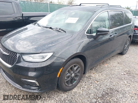 2022 Chrysler Pacifica Touring L with VIN 2C4RC1BG9NR194782, listed as a IAAI auction lot 41842410 with 76,231 mi miles and . Bid and sale history available at DreamBid. Image 18.