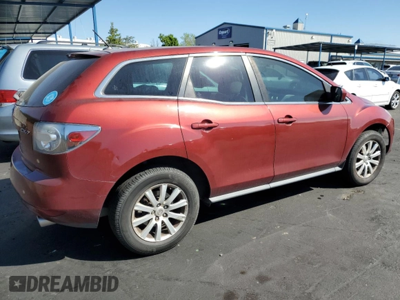 2010 Mazda CX-7 SV z VIN JM3ER2WM3A0321623, wystawiony jako Copart lot #53916965 z przebiegiem 216 749 mil mil oraz Czysty tytuł • Clean title. Historia ofert i sprzedaży dostępna na DreamBid. Obrazek 3.